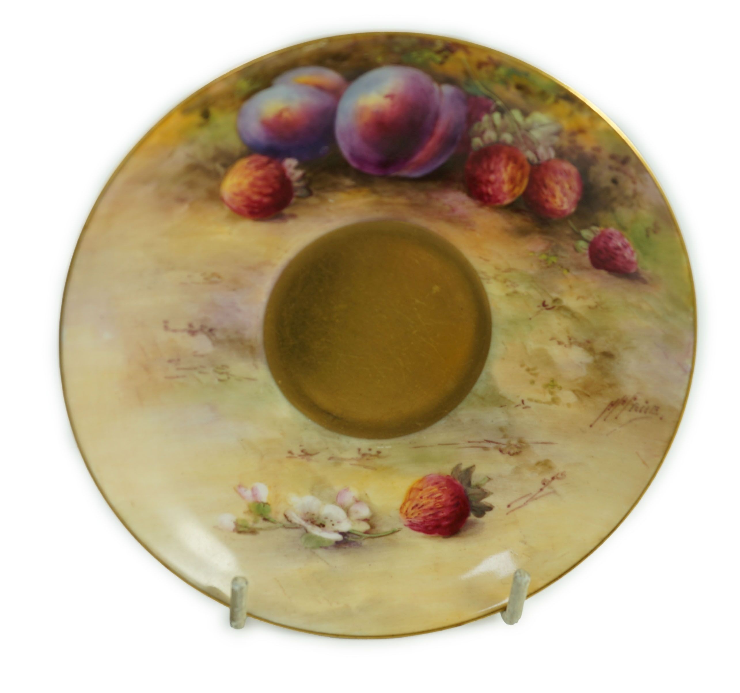 A Royal Worcester fruit painted tea cup and saucer, date code for 1925/6
